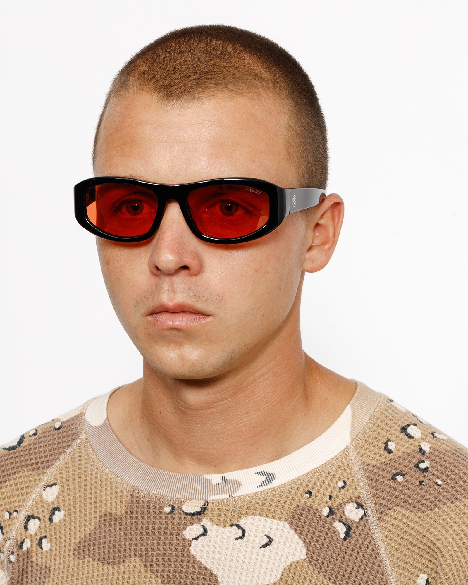 Landon Sunglasses in black / crimson red lens – Stüssy