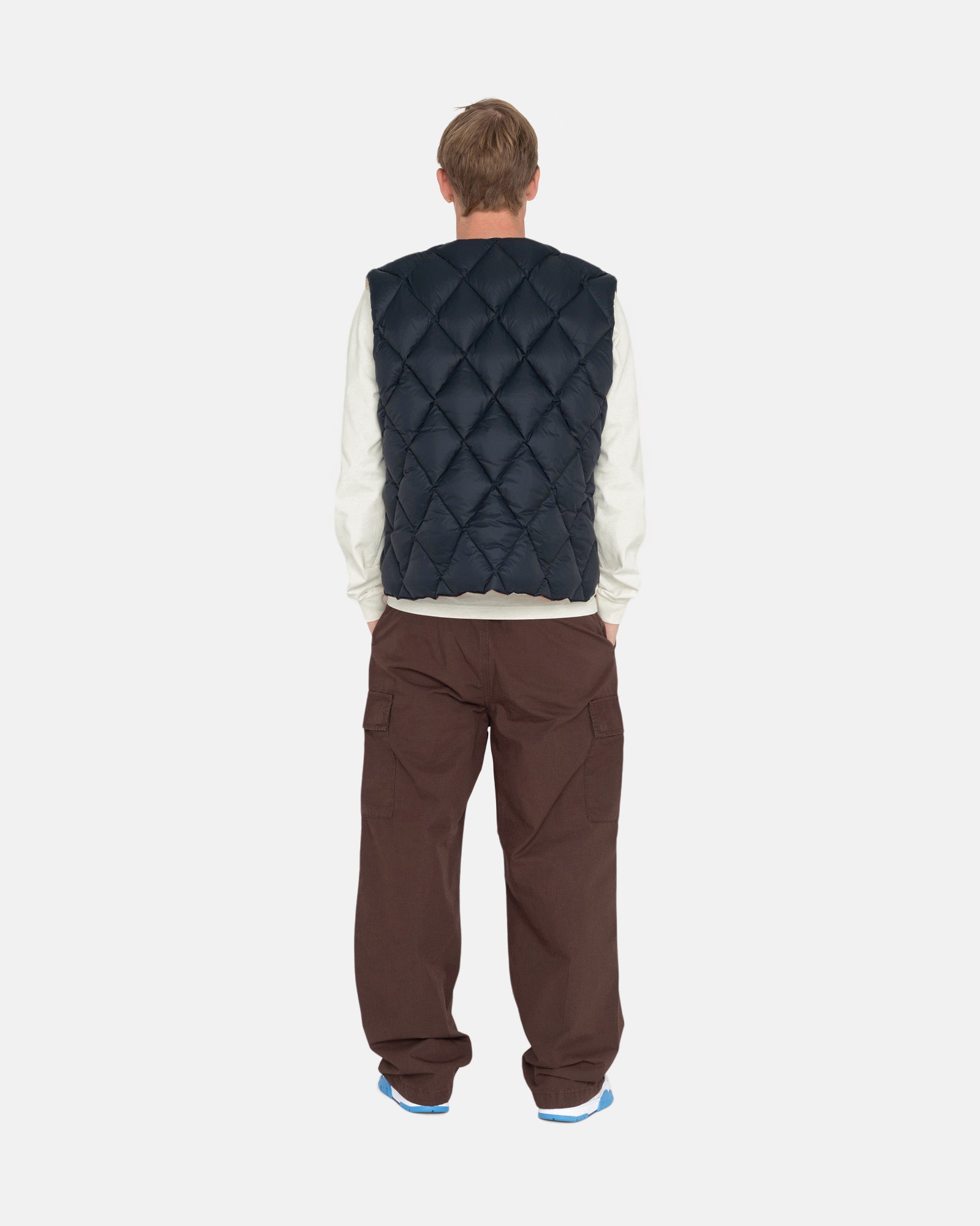 Reversible Quilted Vest - Unisex Jackets & Outerwear | Stüssy